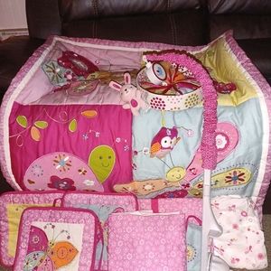 Gently used baby girl crib set 8 pieces